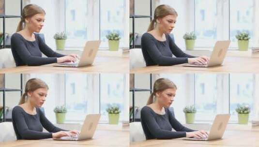 工作中的女人对着电脑欢呼高清在线视频素材下载