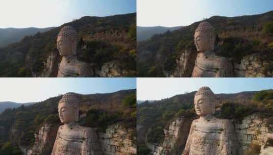 航拍山西太原蒙山大佛旋转下降高清在线视频素材下载