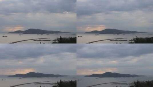 威海湾刘公岛上空的耶稣光和飞云延时4K高清在线视频素材下载
