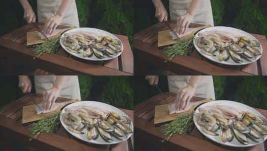 厨师正在木板上切生鱼片高清在线视频素材下载
