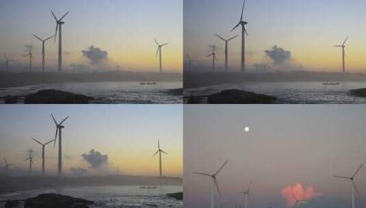 海边清晨月亮下的风力发电高清在线视频素材下载