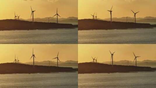 夕阳下风力发电风车航拍高清在线视频素材下载
