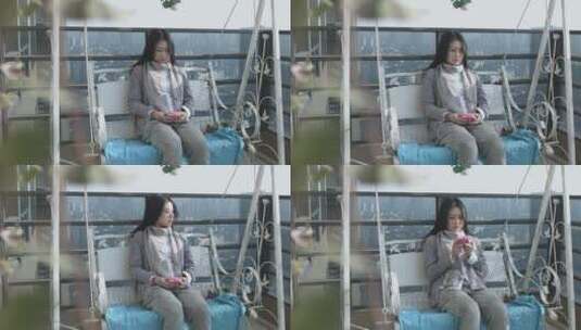 女性居家享受午后阳光高清在线视频素材下载