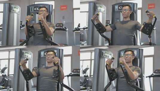 男子在健身房进行胸部力量锻炼高清在线视频素材下载