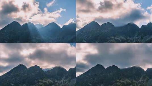 阳光和云彩的神秘之光在迷雾的阿尔卑斯山景观上的运动高清在线视频素材下载