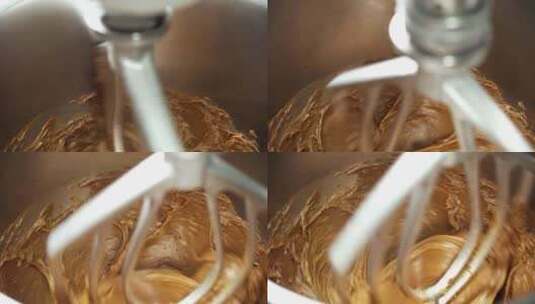 糕点厨师使用手动搅拌器搅拌蛋糕和面包店高清在线视频素材下载