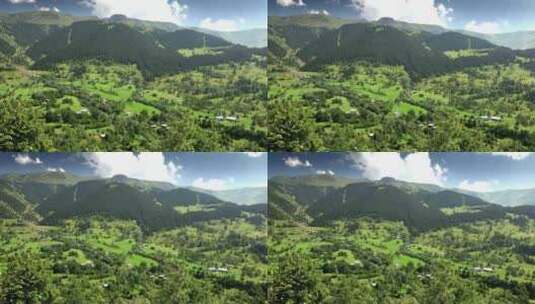 阿尔卑斯山童话般的绿色山谷中的山村高清在线视频素材下载