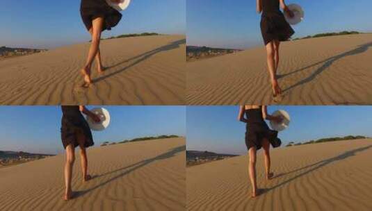 女子步行在沙漠高清在线视频素材下载