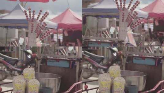 云南普洱集市上的糖葫芦摊子高清在线视频素材下载