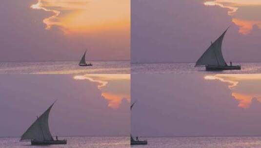 日落时航行的帆船宁静的景色日落地平线高清在线视频素材下载