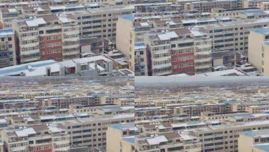 城镇居民楼屋顶雪景上摇4高清在线视频素材下载