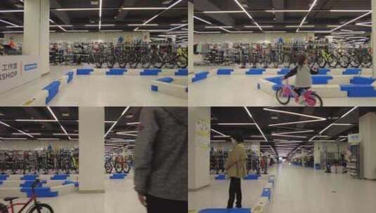 体育用品店家长陪小孩练习自行车高清在线视频素材下载