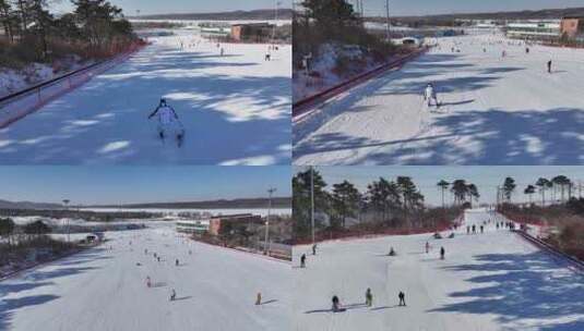 冬季游玩滑雪场滑雪航拍4K高清在线视频素材下载