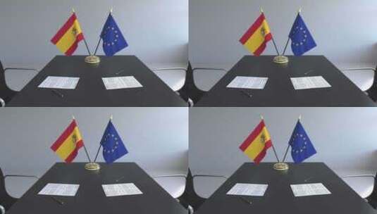 桌子上的西班牙和欧盟旗帜高清在线视频素材下载