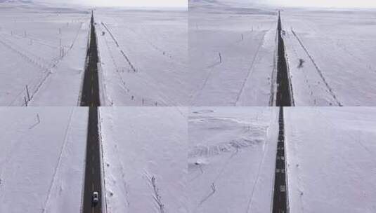 被积雪覆盖的旷野中的公路高清在线视频素材下载