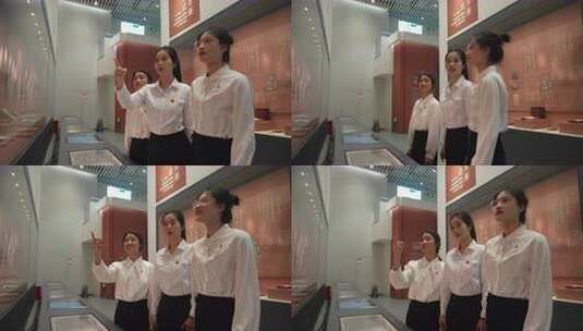 女性参观展览并交流指点高清在线视频素材下载