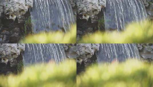中式园林花园公园假山瀑布流水景高清在线视频素材下载