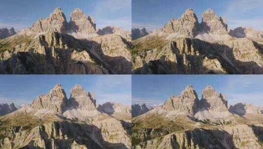 美丽的无人机镜头揭示了意大利白云石自然公园的特雷·西梅山峰高清在线视频素材下载
