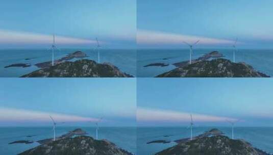 傍晚海岛风车航拍大海风力发电海洋风电风景高清在线视频素材下载