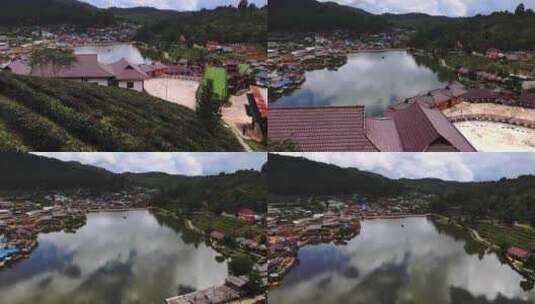 无人机向前移动拍摄的拉克泰国村中间的湖泊，周围是山ra高清在线视频素材下载