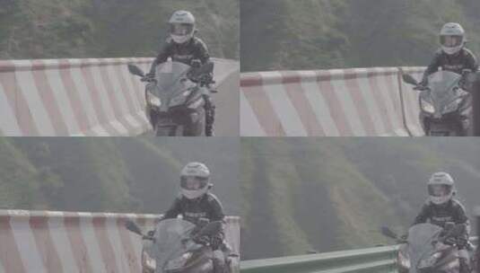 女骑士在山路里骑行摩托9高清在线视频素材下载