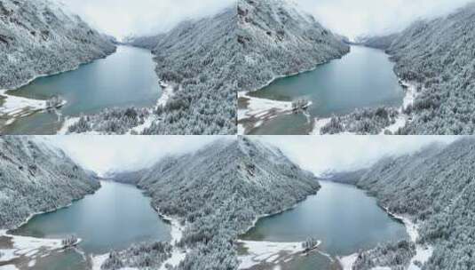 西藏林芝巴松措，雪山森林湖泊的雪景航拍高清在线视频素材下载