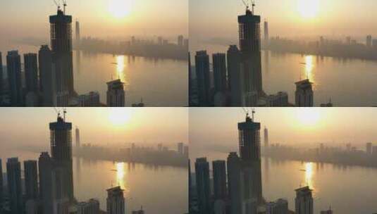 武汉江滩航拍延时夕阳江面近处大楼高清在线视频素材下载
