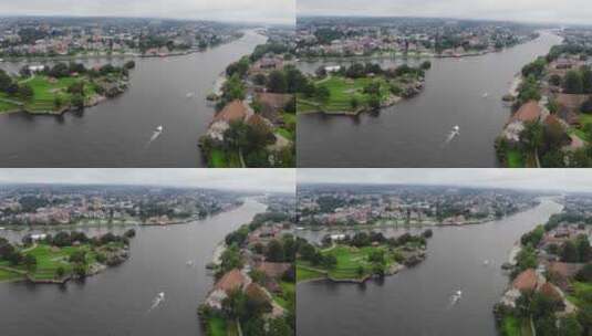 航拍河流两畔自然城市高清在线视频素材下载