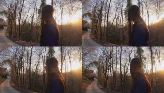 日落时分在森林里散步的女人高清在线视频素材下载