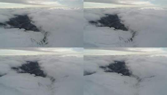 从上方被云层覆盖的雪地高清在线视频素材下载