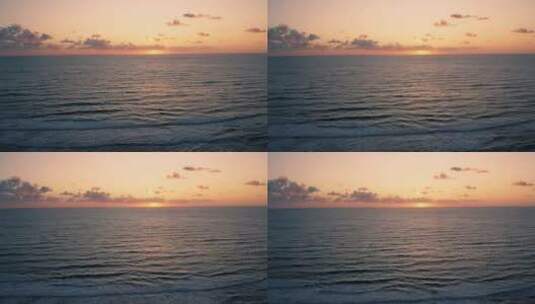 海洋上橙色的日落高清在线视频素材下载