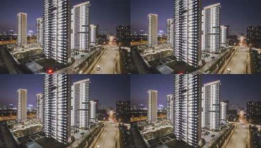 航拍夜晚城市城区居民小区现代高层住宅楼高清在线视频素材下载
