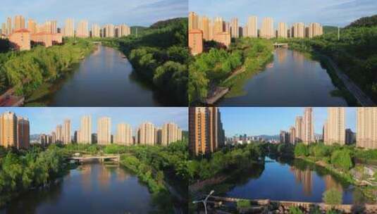 航拍城市河流和两侧楼房住宅宜居城市环境高清在线视频素材下载