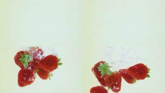 高速拍摄落入水中的草莓高清在线视频素材下载