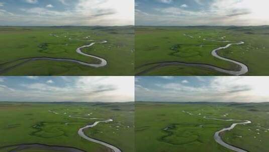 航拍绿色牧场蜿蜒河流高清在线视频素材下载