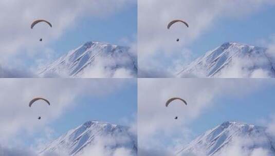 空中飞行的滑翔伞高清在线视频素材下载