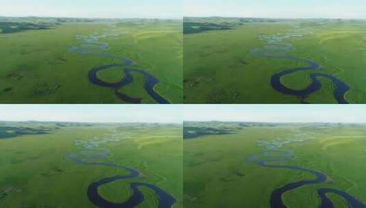 航拍绿色草原蓝色河湾高清在线视频素材下载