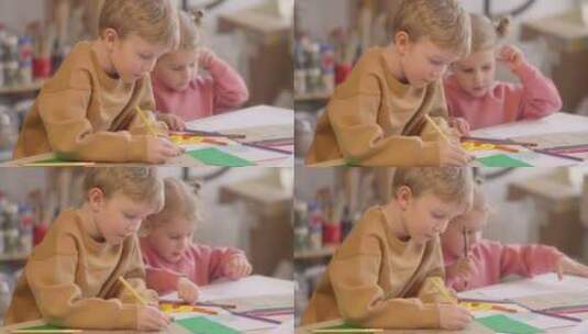 在纸上画画的孩子高清在线视频素材下载