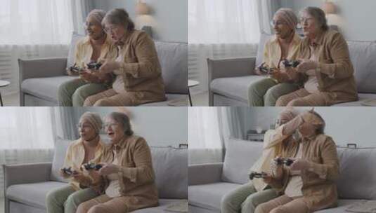 母女一起玩电子游戏高清在线视频素材下载