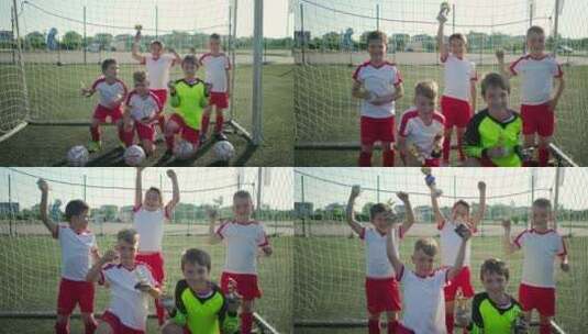 儿童足球队欢呼庆祝胜利高清在线视频素材下载