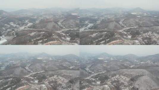 南阳山脚下雪景农村老房屋无人机航拍高清在线视频素材下载