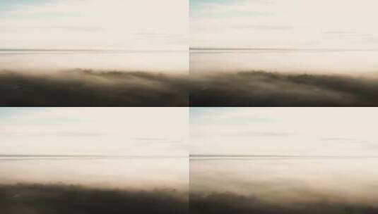 云上特写航拍日出前浓雾笼罩森林高清在线视频素材下载