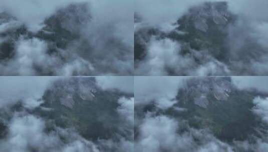 清晨航拍川西甘孜稻城亚丁云雾缭绕高山风景高清在线视频素材下载