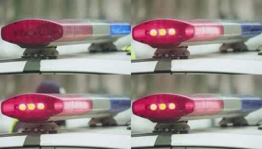 警车上闪烁的警灯特写高清在线视频素材下载