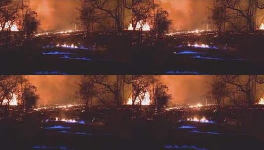 火山的爆发和熔岩流蓝色火焰高清在线视频素材下载