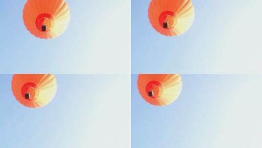 橙色热气球飞翔高清在线视频素材下载