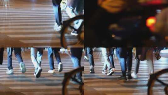 城市夜晚人行道上行走的人流脚步高清在线视频素材下载
