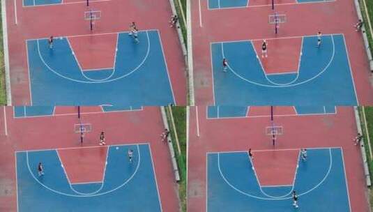 航拍城市校园篮球场上运动健身的少年高清在线视频素材下载