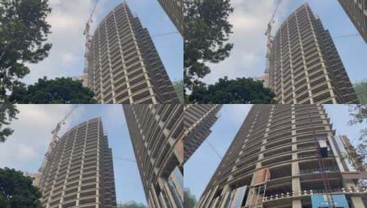 仰视城市高楼塔吊城市工地施工摇高清在线视频素材下载