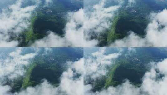 俯瞰云雾中的山川大地森林高清在线视频素材下载